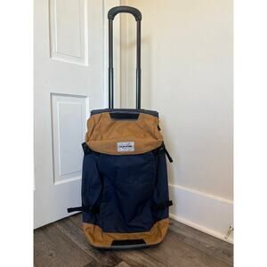 Dakine Sherpa 60L roller duffel bag luggage tan and blue black hole travel